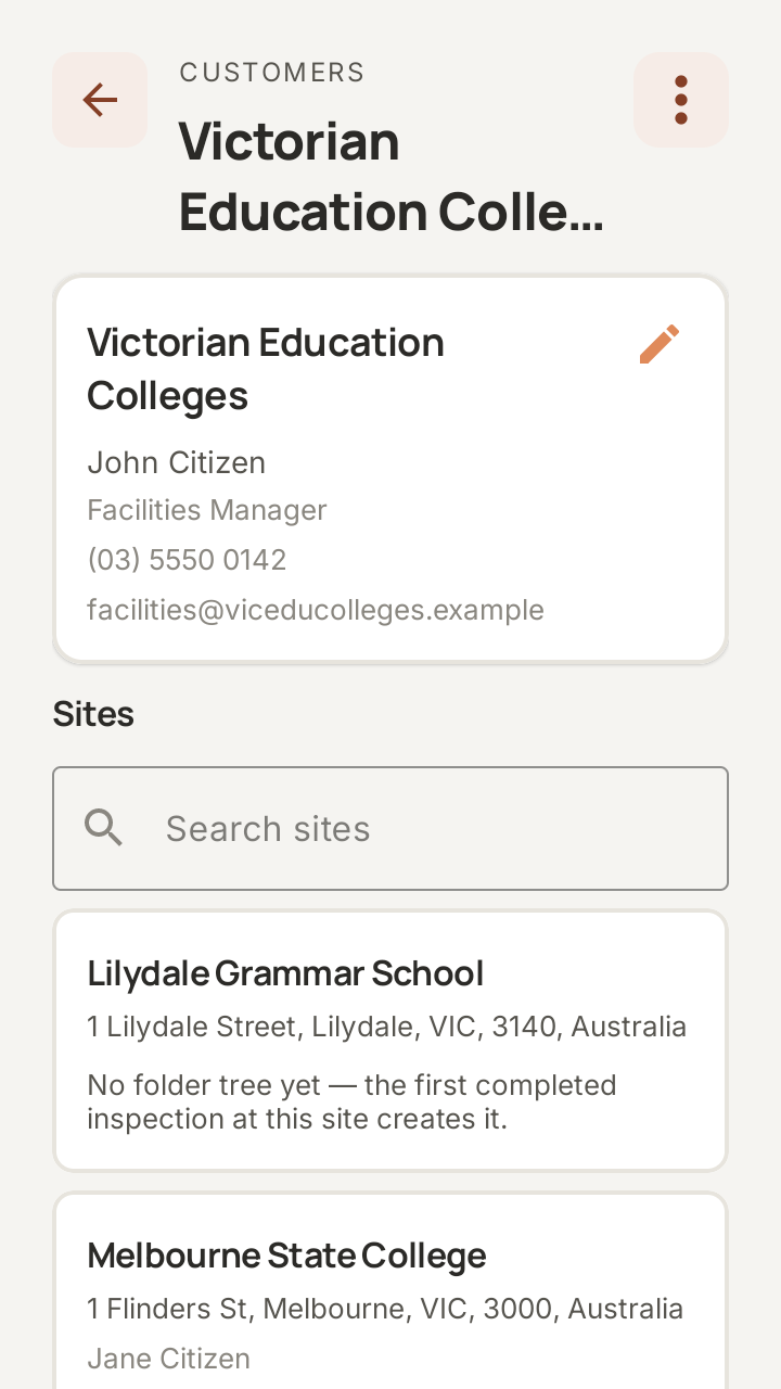 SwitchReport on the FLIR i34: the customer screen for Victorian Education Colleges, with the facilities manager's contact details above a list of sites, Lilydale Grammar School and Melbourne State College, each with its address.